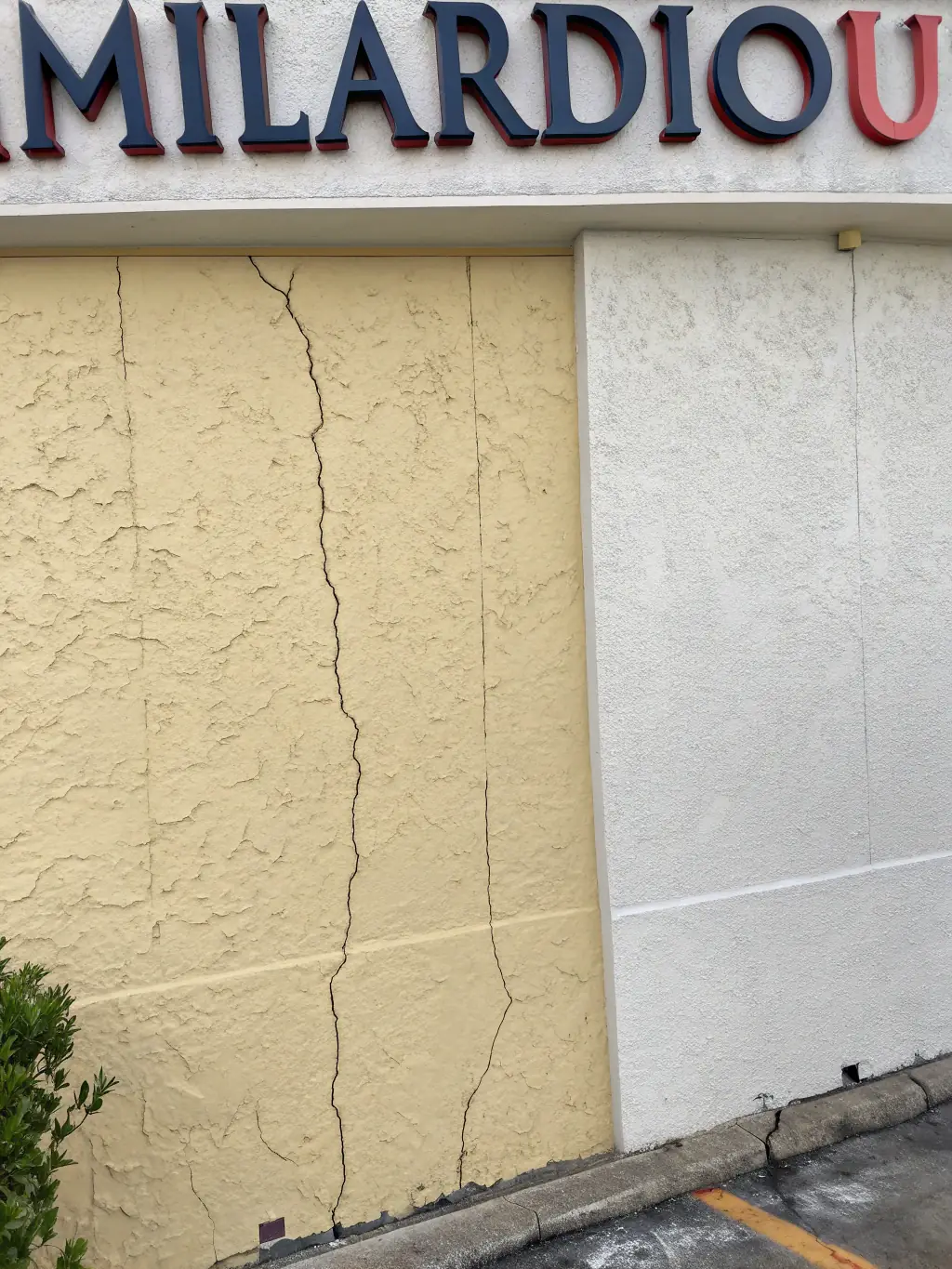 A before-and-after image showing a cracked wall before repair and a smooth, crack-free wall after The Patch Boys' crack repair service.